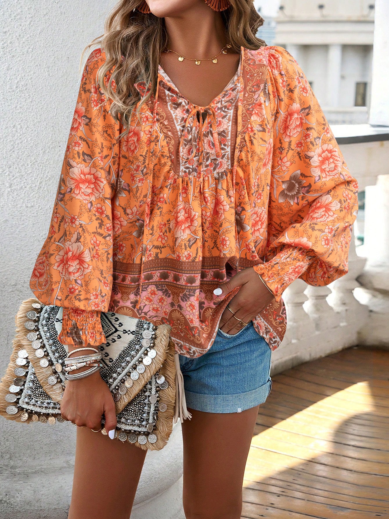 Printed V-neck lace up long sleeved shirt for women