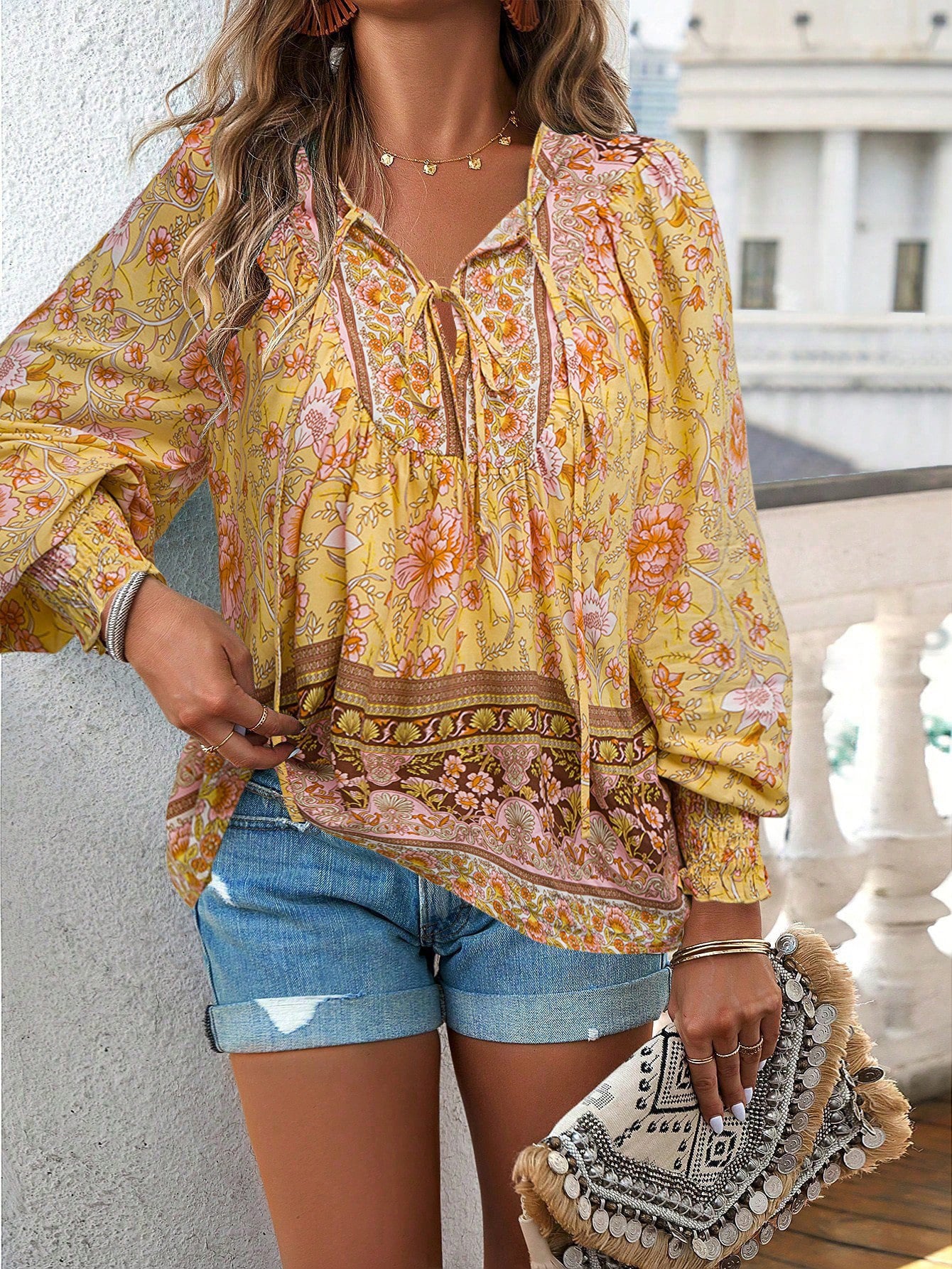 Printed V-neck lace up long sleeved shirt for women